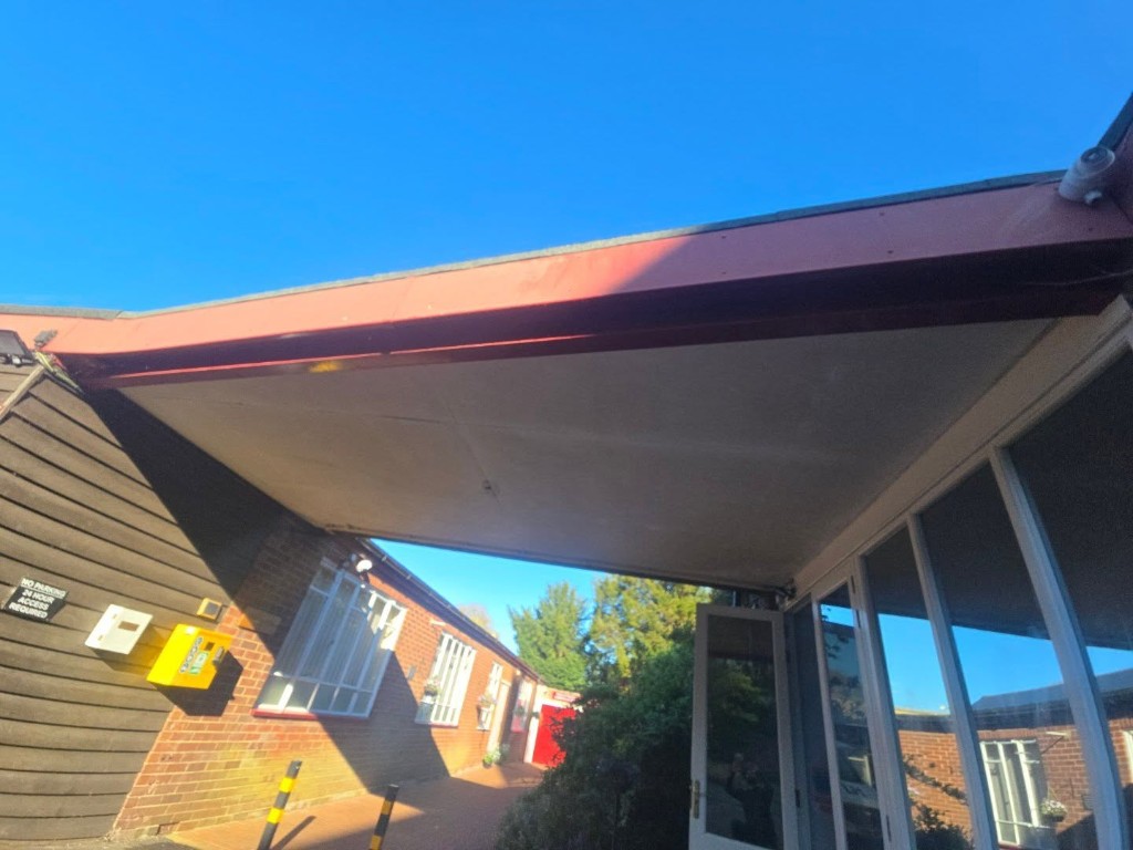 The canopy underside before the repair, with the old boarding still in place