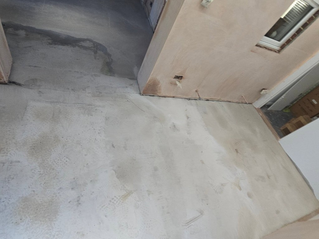 The extension screeded and plastered before the floor was tiled