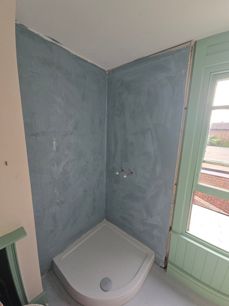 Shower area waterproofed, with the new tray in place